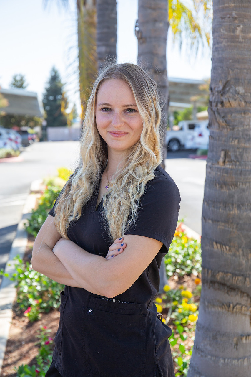Hannah, certified massage therapist and founder of Serenity Garden Massage and Wellness